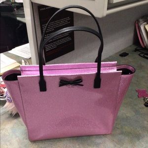 Gently used Kate Spade large glitter zipper tote.